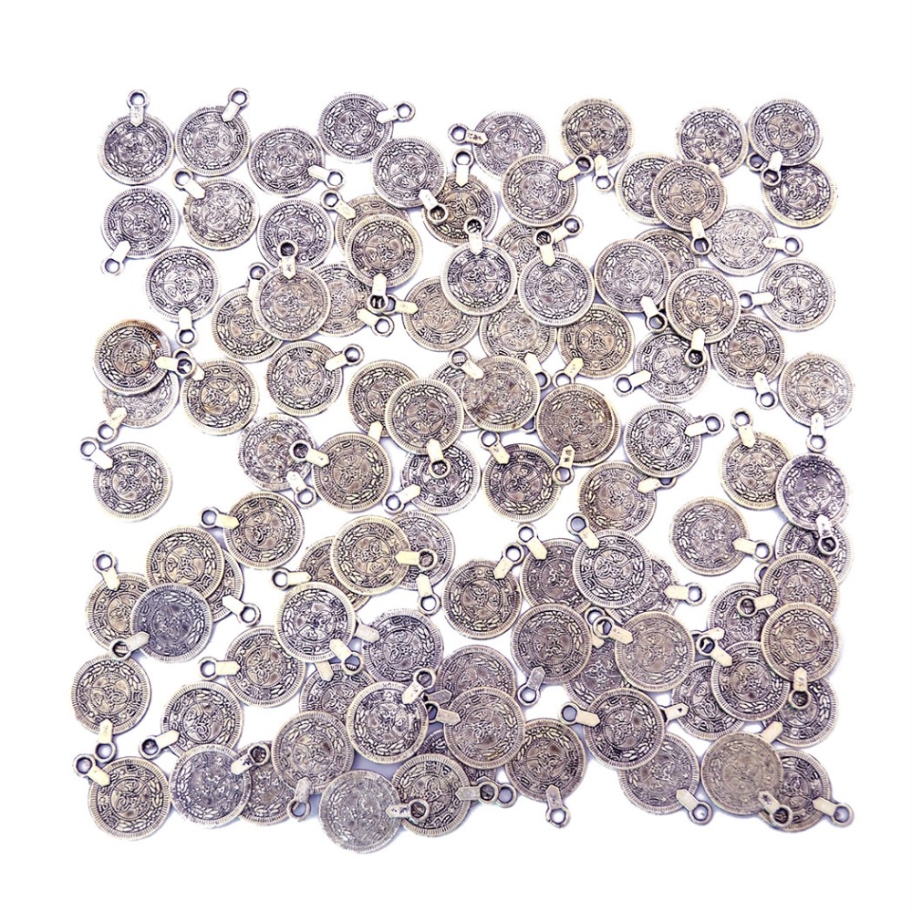 Moneda tallada de playa afgana - Ethnic Fashion Co In reseña y precio